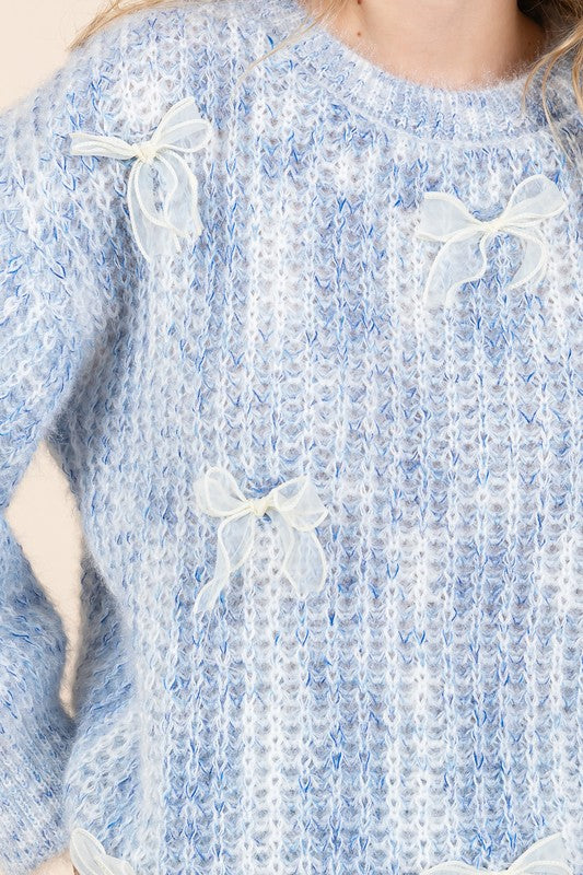 Melina® | Gruby sweter z dzianiny z haftowaną kokardką