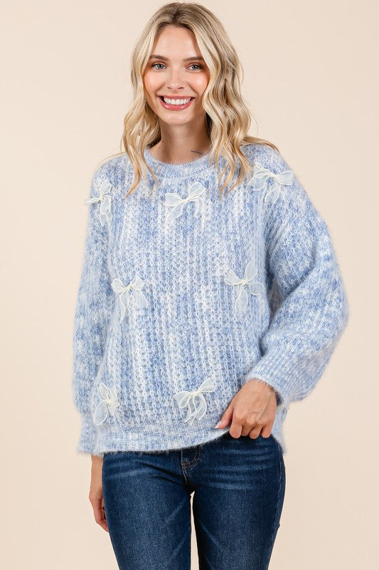Melina® | Gruby sweter z dzianiny z haftowaną kokardką