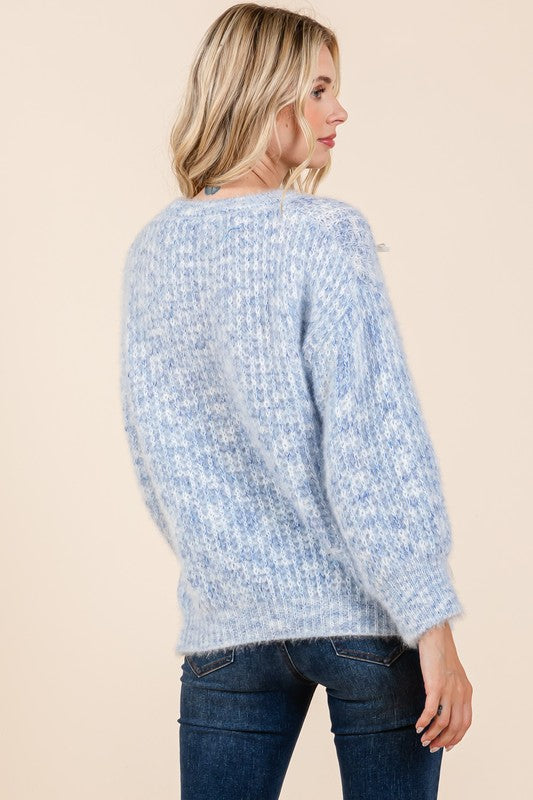 Melina® | Gruby sweter z dzianiny z haftowaną kokardką