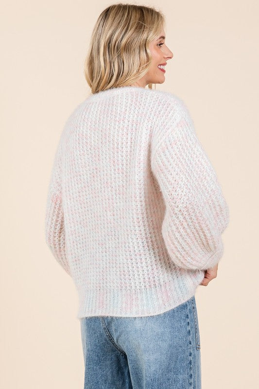 Melina® | Gruby sweter z dzianiny z haftowaną kokardką