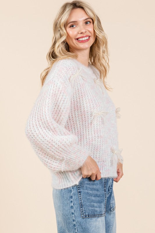 Melina® | Gruby sweter z dzianiny z haftowaną kokardką