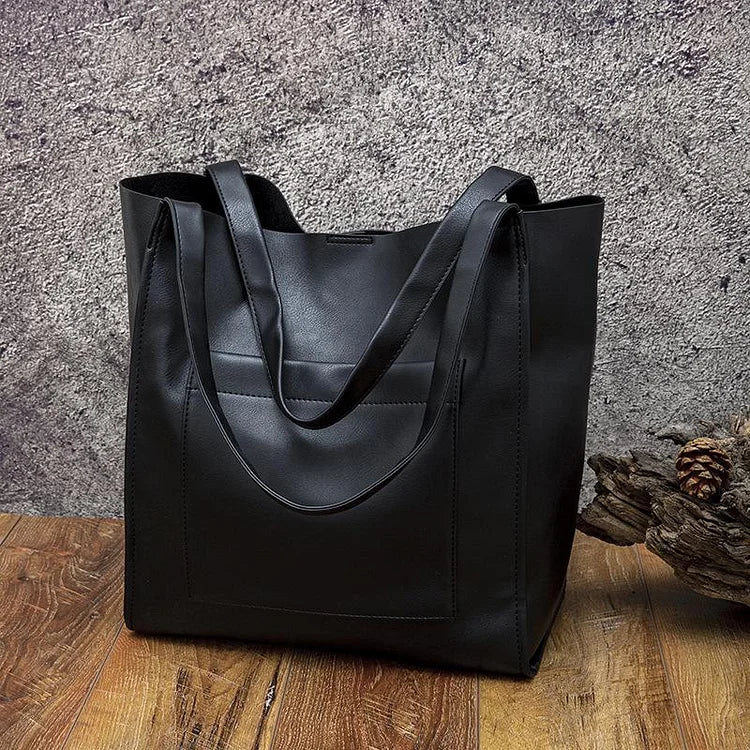 Torebka vintage wykonana z miękkiej skóry z olejowoskiem