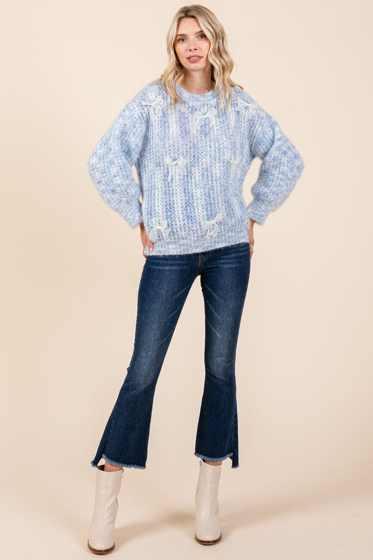 Melina® | Gruby sweter z dzianiny z haftowaną kokardką