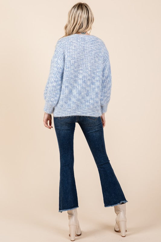 Melina® | Gruby sweter z dzianiny z haftowaną kokardką